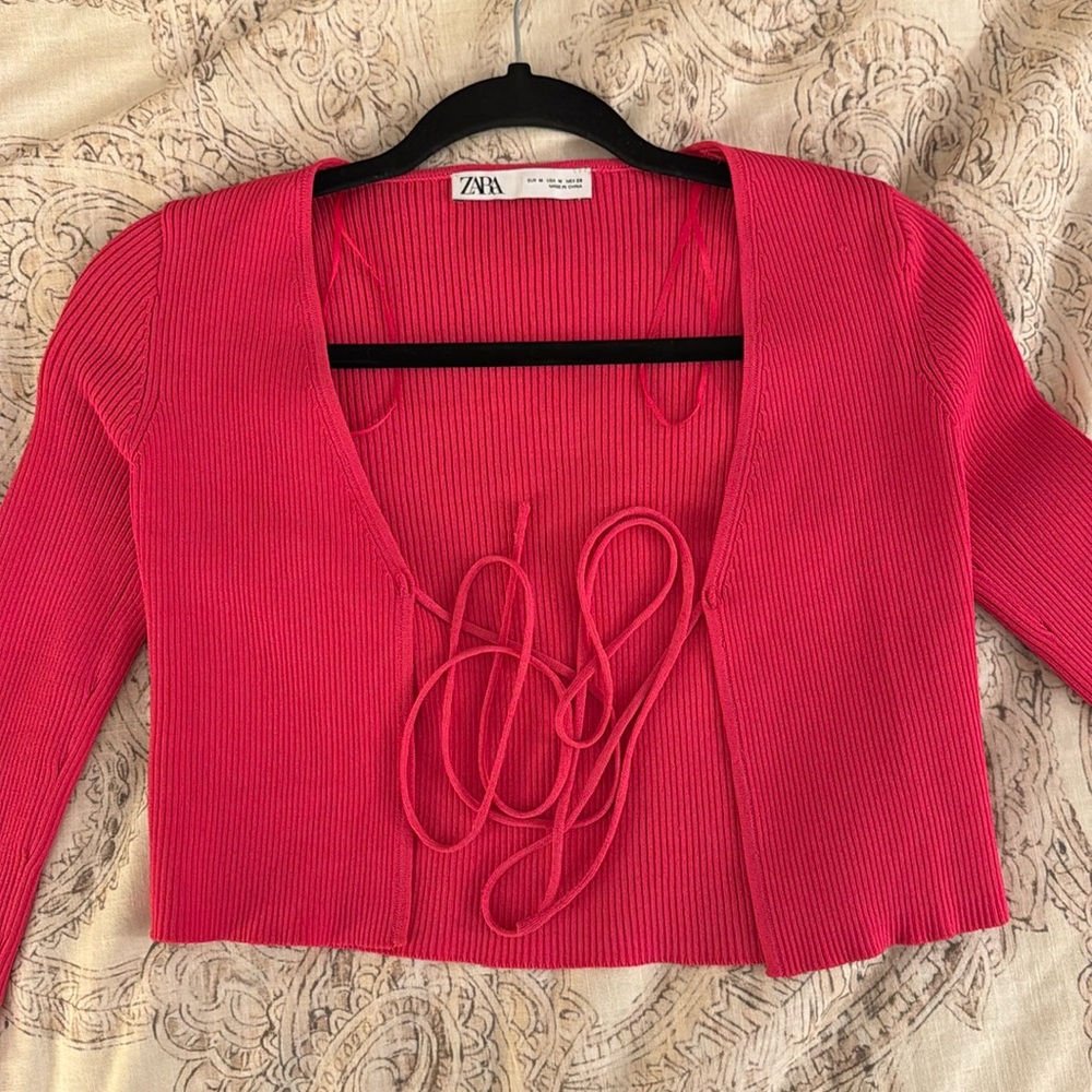 Hot pink full sleeve crop top front tie. Worn only once. Selling due to size :)